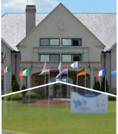 A large building with international flags displayed in front.